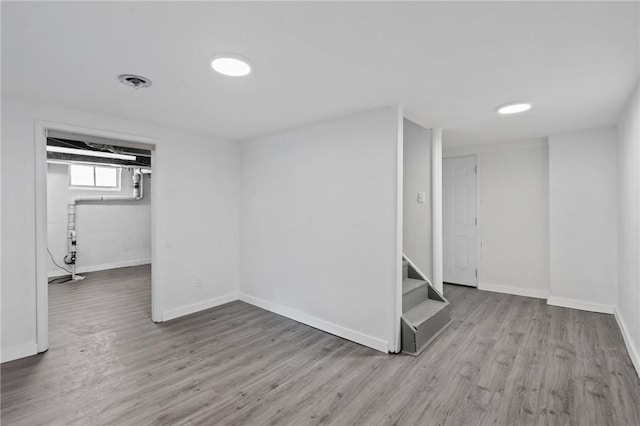 basement with light wood-type flooring