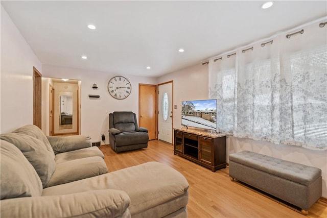 living room with light hardwood / wood-style floors