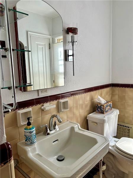 bathroom with toilet and sink