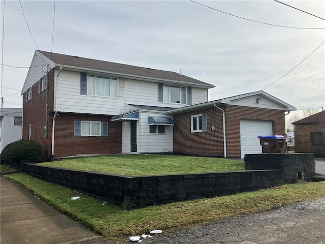 view of front property with a garage and a front lawn