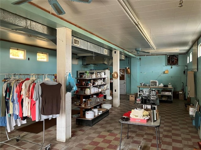 miscellaneous room featuring ceiling fan