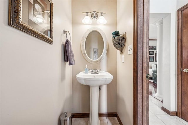 bathroom with sink and tile patterned flooring