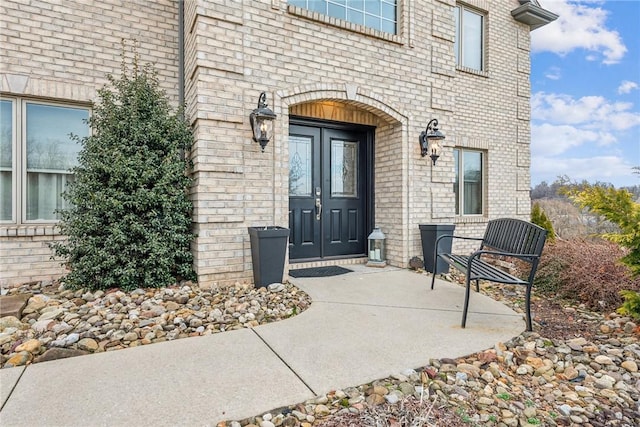 doorway to property featuring a patio area