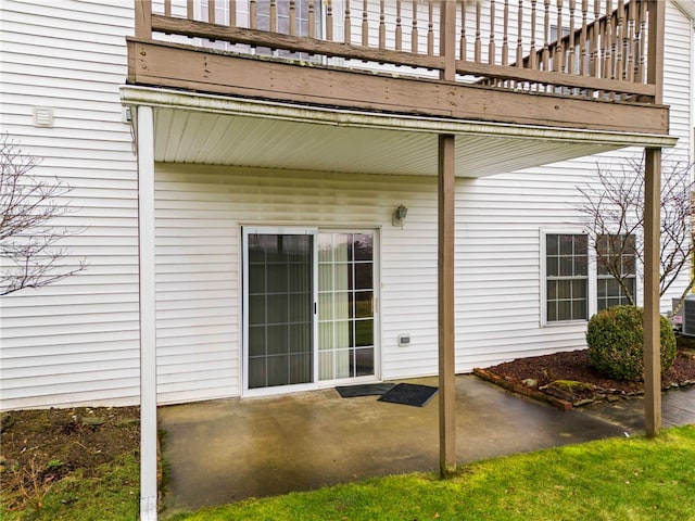 doorway to property with a patio area