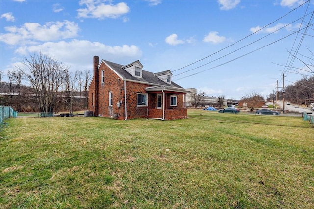 3260 Rainbow Run Rd, Forward Twp Eal, PA 15063 - view of home's exterior with brick siding, a chimney, and central AC
