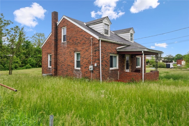 3260 Rainbow Run Rd, Forward Twp Eal, PA 15063 - view of side of home with brick siding and a chimney