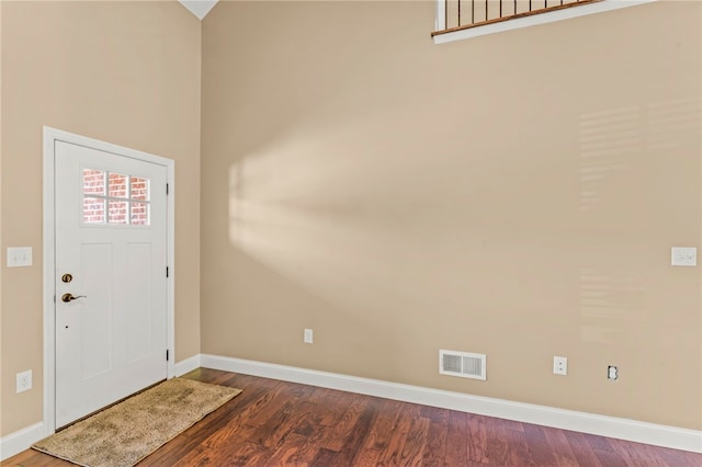 entrance foyer featuring hardwood / wood-style flooring