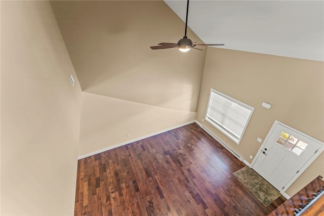 entrance foyer with ceiling fan, dark hardwood / wood-style floors, and high vaulted ceiling