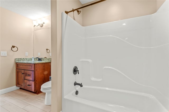 full bathroom with vanity, toilet, shower / washtub combination, and tile patterned flooring