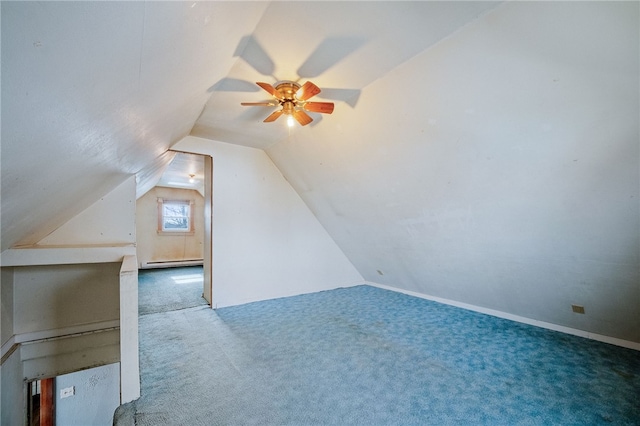 additional living space featuring ceiling fan, a baseboard radiator, lofted ceiling, and carpet