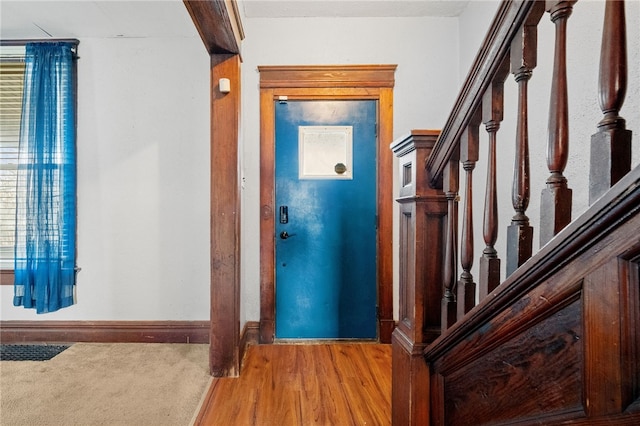 entrance foyer featuring hardwood / wood-style floors