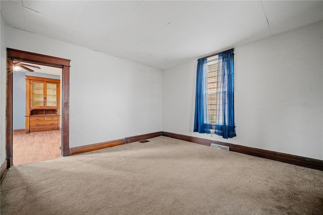 unfurnished room with carpet