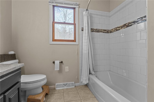 full bathroom with vanity, tile patterned floors, toilet, and shower / bath combo