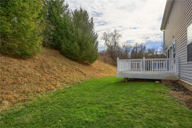 view of yard with a deck