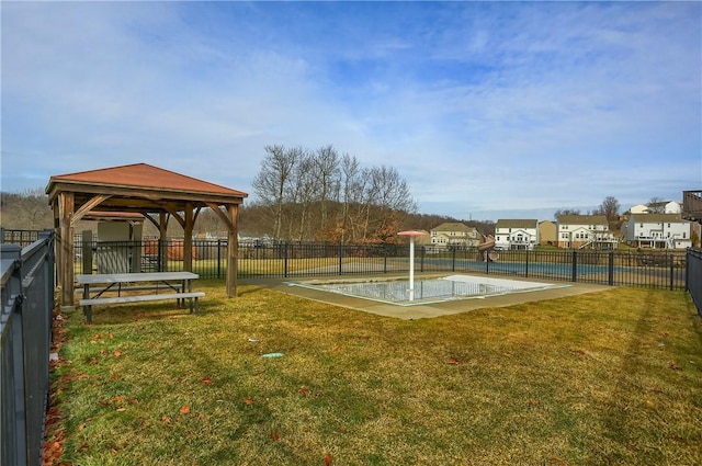 view of property's community featuring a gazebo and a yard