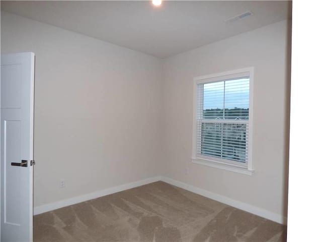 empty room with carpet floors