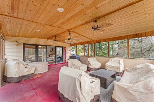 carpeted living room with wood ceiling and ceiling fan