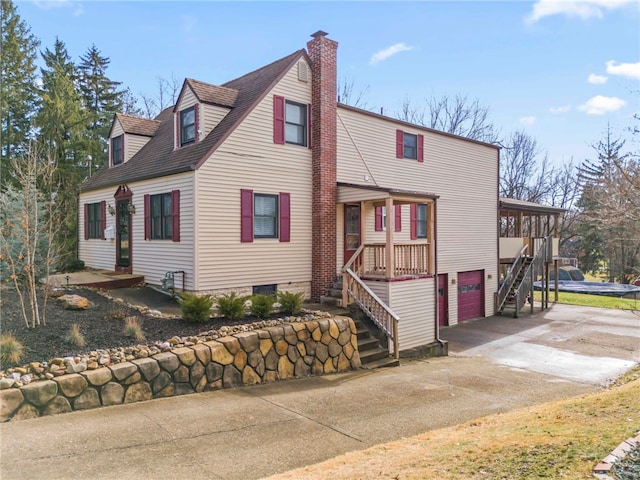 view of side of home with a garage