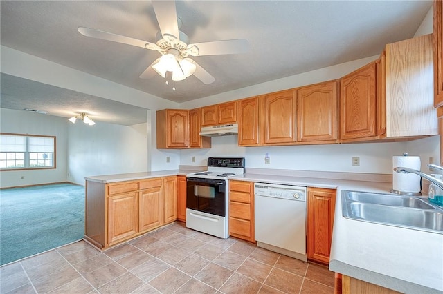 kitchen featuring range with electric stovetop, kitchen peninsula, light colored carpet, ceiling fan, and white dishwasher