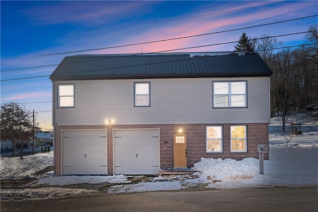 view of front of home featuring a garage