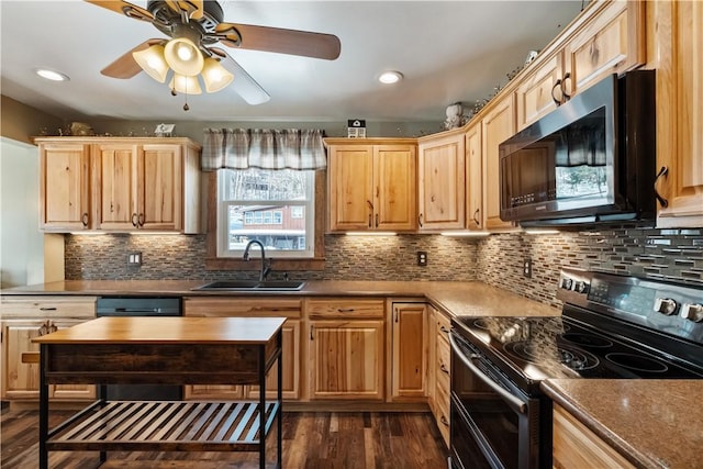 kitchen with tasteful backsplash, sink, range with two ovens, ceiling fan, and dark wood-type flooring