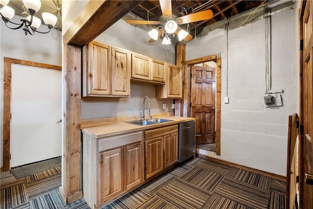 kitchen featuring ceiling fan with notable chandelier, sink, stainless steel dishwasher, and light brown cabinetry