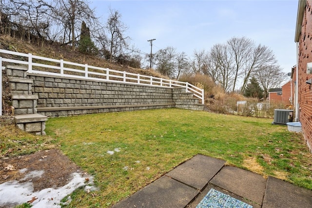 view of yard with central AC