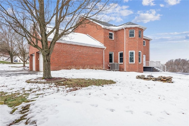 view of snow covered property