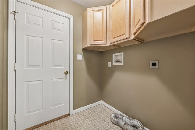 laundry area with electric dryer hookup, hookup for a washing machine, and cabinets