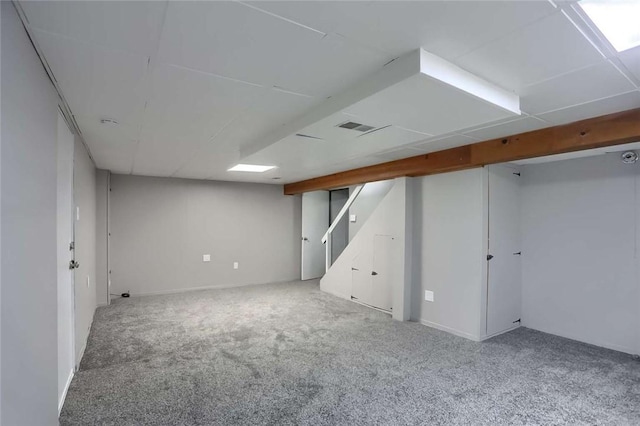 basement featuring carpet flooring