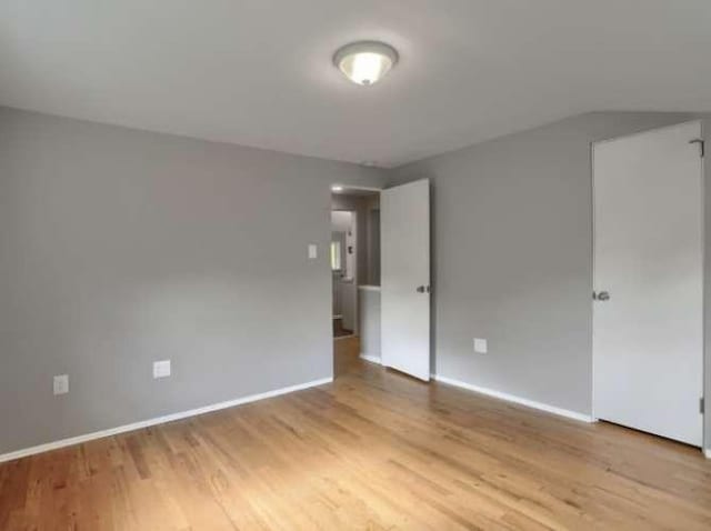 unfurnished room featuring light hardwood / wood-style floors