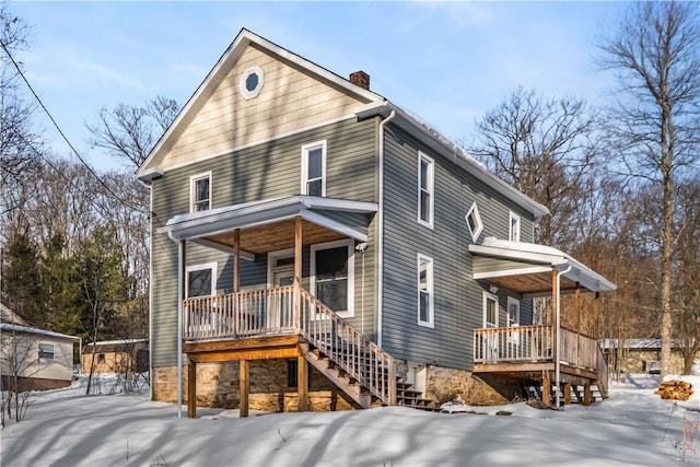 view of front property featuring covered porch