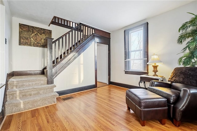 sitting room with light wood-type flooring