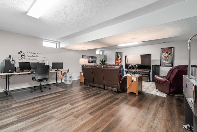 home office with hardwood / wood-style flooring and a textured ceiling