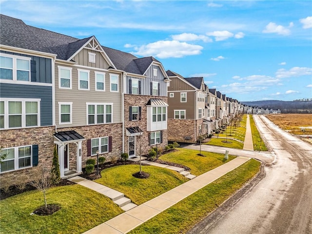 exterior space featuring a front lawn