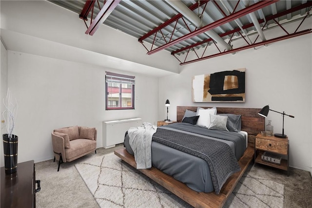 bedroom featuring light colored carpet