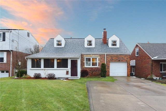 new england style home with a lawn