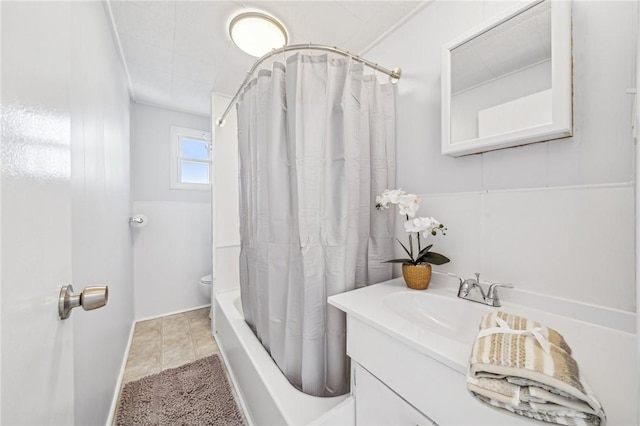 full bathroom with tile patterned flooring, vanity, shower / tub combo with curtain, and toilet