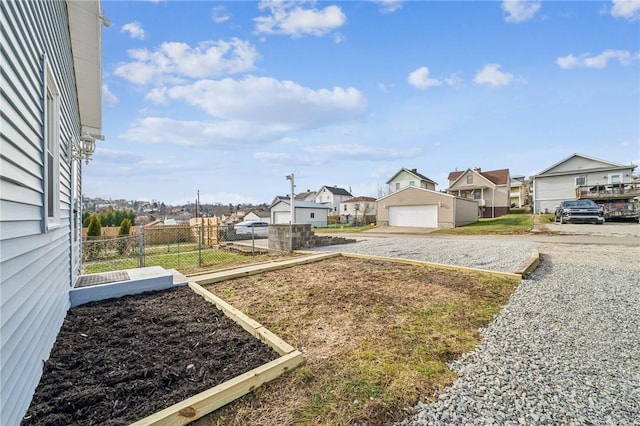 view of yard featuring a garage