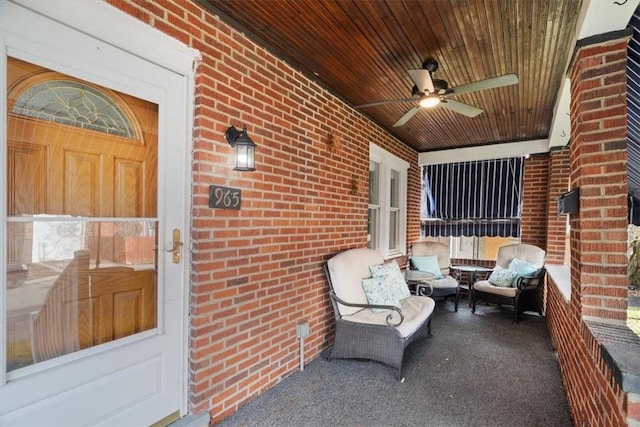 view of patio / terrace with ceiling fan and a porch