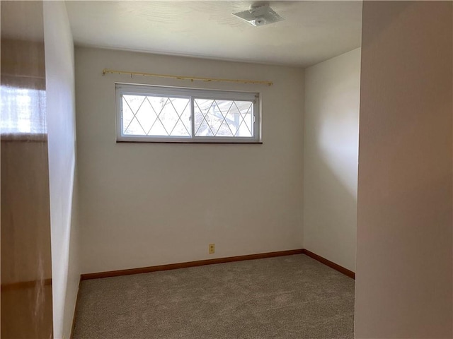 view of carpeted spare room