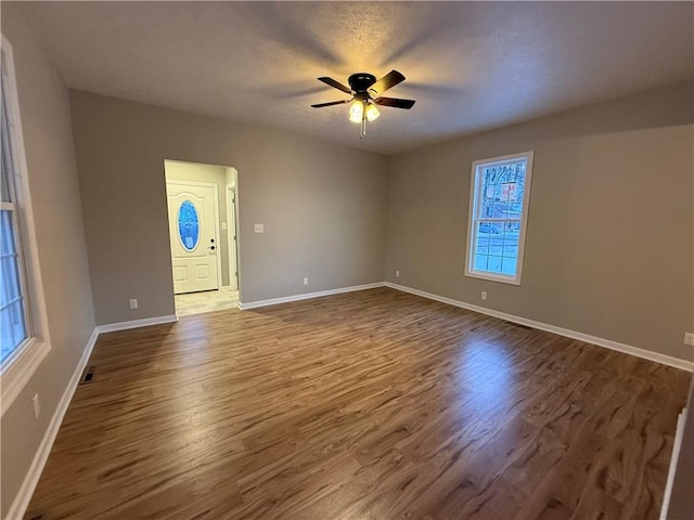 interior space featuring ceiling fan and hardwood / wood-style floors