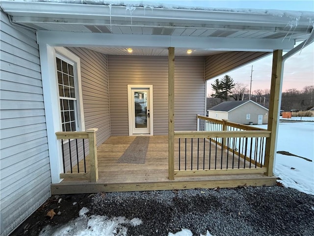 view of snow covered deck