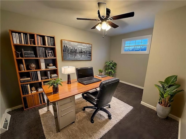 carpeted home office with ceiling fan