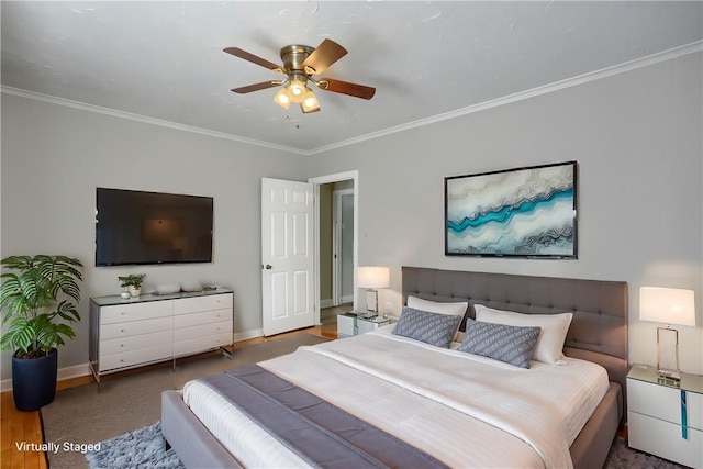 bedroom featuring crown molding and ceiling fan