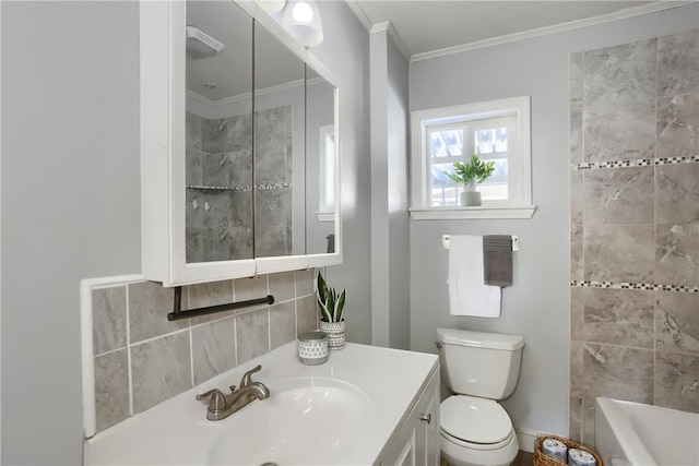 full bathroom with crown molding, shower / bathing tub combination, vanity, and toilet