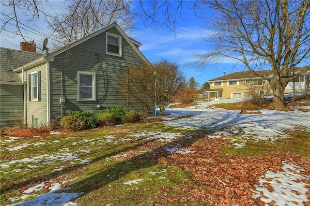 view of snow covered property