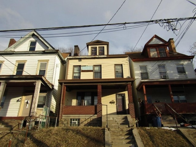 view of front of home featuring covered porch