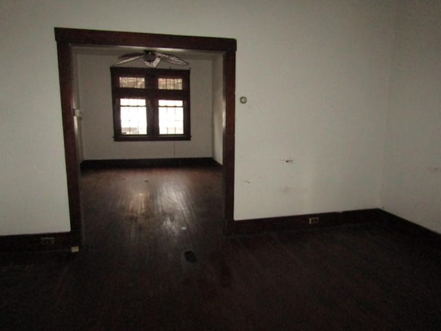 empty room featuring dark hardwood / wood-style floors