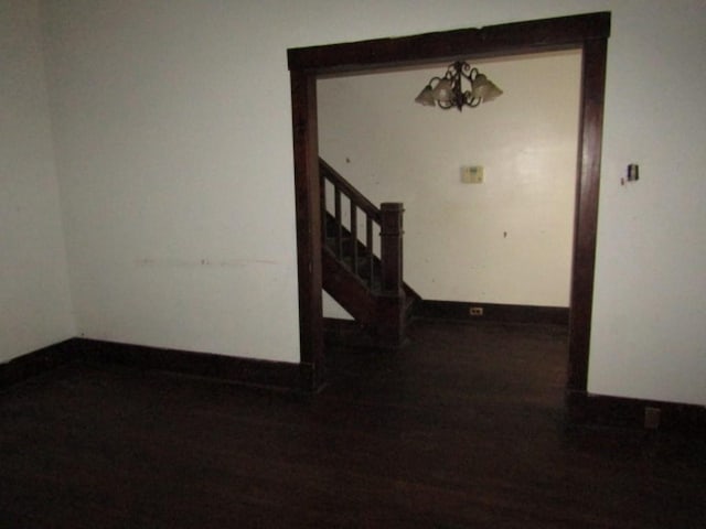 unfurnished room featuring hardwood / wood-style flooring